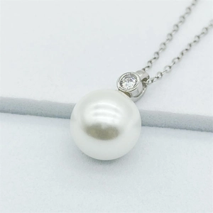 Elegant S925 sterling silver necklace featuring a large white pearl and zircon pendant