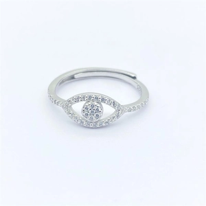 Macro detail of S925 sterling silver evil eye ring with pavé sparkling crystals
