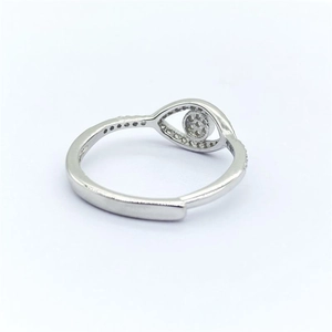 Macro detail of S925 sterling silver evil eye ring with fine pave zircon inlay setting