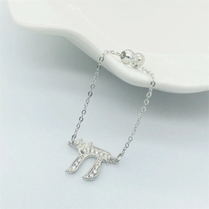 Adjustable S925 sterling silver chain ring with Chai symbol and sparkling cubic zirconia