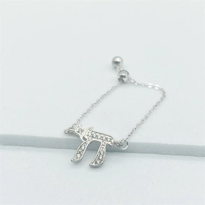 Adjustable S925 sterling silver chain ring featuring a sparkling Hebrew Chai symbol charm