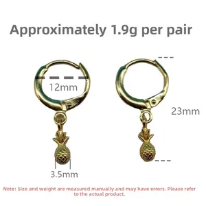Macro detail of gold pineapple drop earrings with hoop closure, 23mm length, 1.9g weight