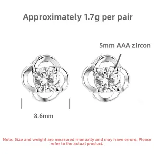Macro detail of S925 silver clover earrings with 5mm AAA cubic zirconia and size dimensions
