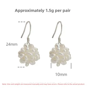 Detail view of handmade S925 silver hook earrings with 10mm freshwater pearl cluster