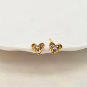 Elegant gold heart-shaped stud earrings with three sparkling round zircons for women