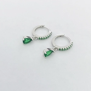 Detail view of pear-cut emerald zircon drop earrings with S925 silver settings