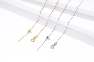 Detail of S925 sterling silver adjustable box chains with slide beads and spring clasps