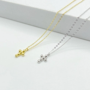 Minimalist 925 sterling silver cross necklace with round beads on a fine O-chain