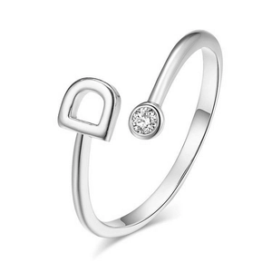 Detailed view of adjustable silver ring with letter D and cubic zirconia stone