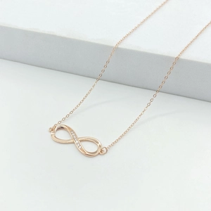 Collana con simbolo infinito in argento 925 oro rosa con brillanti pietre di zircone