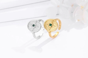 Macro detail of S925 sterling silver stamp on vintage gold and silver shield rings