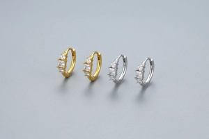 Detailed close-up of S925 sterling silver hoop earrings with geometric cubic zirconia stones