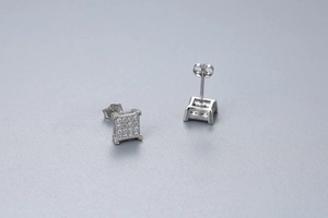 Detailed macro view of S925 sterling silver square stud earrings with micro-pave zircons