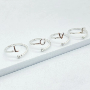 Macro detail of adjustable S925 sterling silver LOVE rings with sparkling cubic zirconia