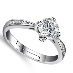 Adjustable 925 sterling silver ring with 6mm round cubic zirconia in classic 4-prong setting