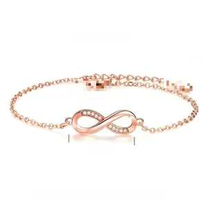 Detail of rose gold infinity bracelet with zircon inlay and adjustable 18+3cm chain length