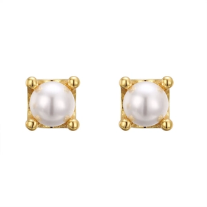 Detailed view of four-claw gold square setting holding round white pearls earrings