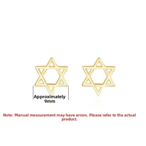 Detail view of 9mm gold star of david stud earrings with minimalist hollow design