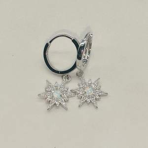Elegant S925 silver hoop earrings with sparkling starburst charms and opal center stone