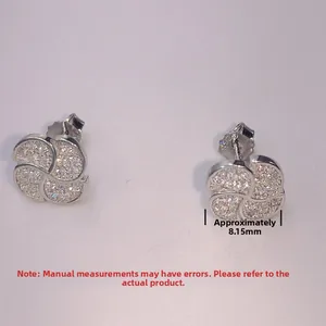 Close-up of S925 sterling silver four-leaf clover stud earrings with 8.15mm pavé diamonds