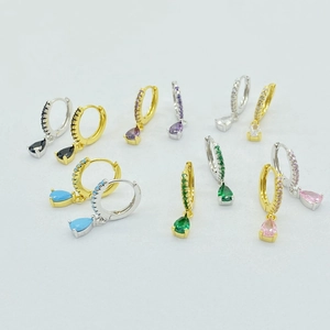 Detail of multi-color pear-cut zircon hoop earrings in gold and silver finish