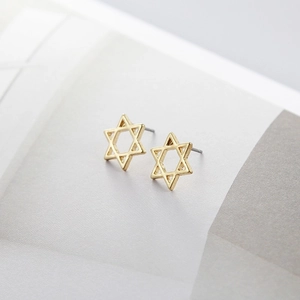 Minimalist S925 sterling silver hollow star stud earrings in elegant gold finish