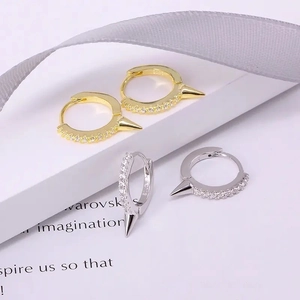 Pair of S925 sterling silver hoop earrings with punk spikes and sparkling cubic zirconia