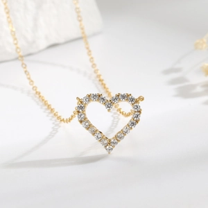 Elegant S925 sterling silver hollow heart necklace with sparkling pavé cubic zirconia