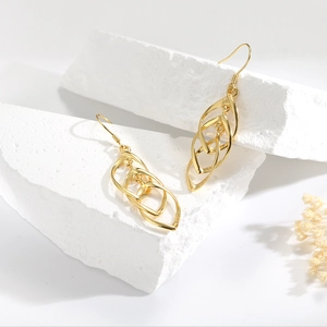 S925 sterling silver gold wavy tassel earrings with minimalist geometric leaf design