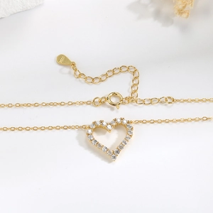 Elegant S925 sterling silver hollow heart necklace with sparkling pavé cubic zirconia