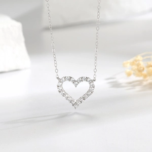 Sparkling S925 sterling silver hollow heart pendant necklace with full cubic zirconia stones