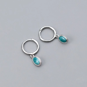 S925 silver hoop earrings featuring oval turquoise pendants with textured borders
