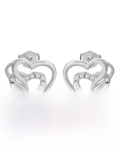 Detail of 925 sterling silver heart earrings with micro-set cubic zirconia stones