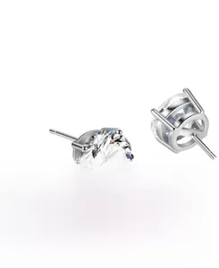 Macro view of classic four-prong setting cubic zirconia stud earrings in S925 silver