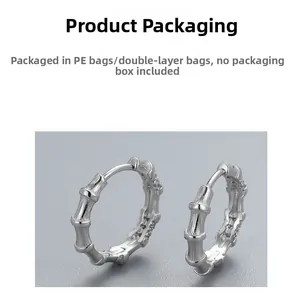 Detail shot of bamboo joint S925 sterling silver hoop earrings with inlaid zircons