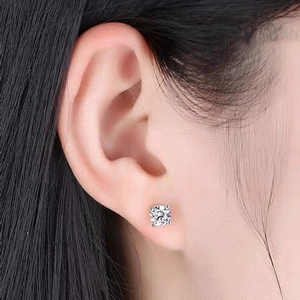 Classic S925 sterling silver four-prong round zircon stud earrings on model