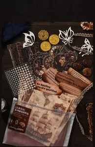 Macro detail of vintage scrapbook kit with antique clock stickers and paper butterflies