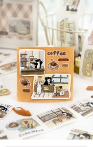 Detail of cat cafe themed washi tape featuring hand-drawn coffee and rabbit illustrations