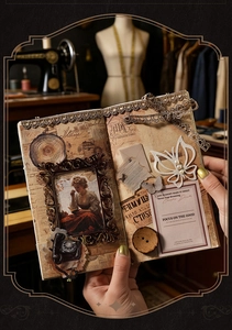 Close-up of Dark Academia scrapbooking set with vintage lace, butterfly and button details