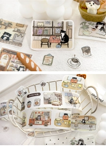 Macro shot of cute cartoon cat coffee shop washi tape for DIY journaling and decoration