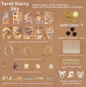 Flat lay of vintage scrapbooking kit with tarot paper, stickers and retro charms