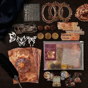 Vintage DIY scrapbook kit with lace, pearls and antique paper in a zipper bag