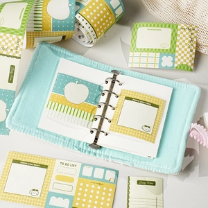 Coffret papeterie avec classeur vert menthe et rubans décoratifs motif pomme