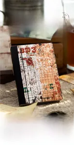 Detailed view of the vintage Old Bill Series scrapbooking stickers with a grid cover