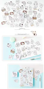 Close-up of cute cartoon cat stickers with box, perfect for DIY planners and scrapbooks