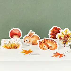 Autumn forest sticker set featuring hand-drawn deer and mushrooms on a green backdrop