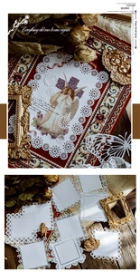 Detailed laser-cut white lace paper material with vintage angel pattern for scrapbooking