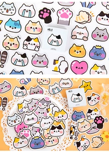 Macro shot of 45 pieces of cute cartoon cat stickers for DIY journals and scrapbooking