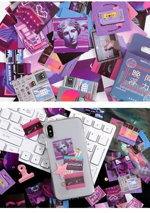 Macro shot of vaporwave retro stickers featuring aesthetic purple and magenta dreamlike art