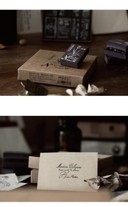Close-up of vintage wooden stamp set with floral patterns and kraft paper packaging